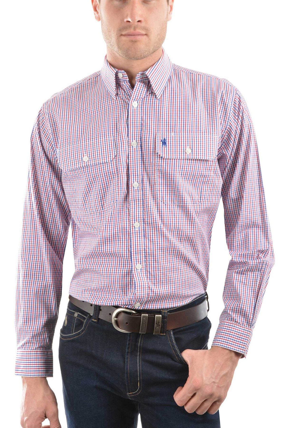 A man wears a Thomas Cook Wentworth Shirt—a long-sleeve, red, white, and blue check 100% cotton button-up with front pockets and chest logo embroidery—paired with dark blue jeans and a brown belt.