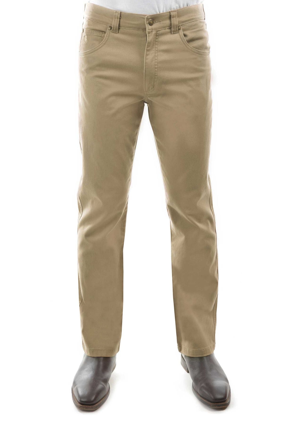 A person wears the Thomas Cook Tailored Moleskin Jean in light brown khaki with dark brown dress shoes, standing against a white background. Only the lower half of their body is shown.