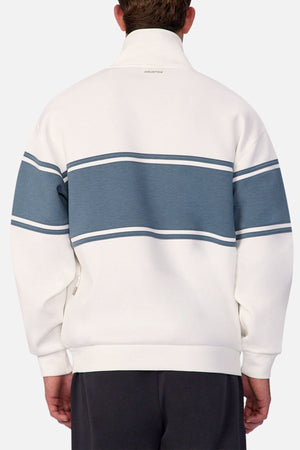 Someone is seen from behind wearing the Industrie The Tech Southend Track Top in white, featuring blue horizontal stripes across the upper back and sleeves, creating a stylish and casual look. Only the jacket’s back plus head and arms are visible.
