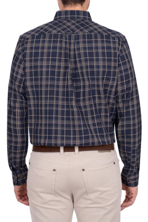 A person is shown from the back, wearing the Thomas Cook Adam Shirt—navy blue plaid, long-sleeve, 100% cotton—and light beige pants, set against a white background.