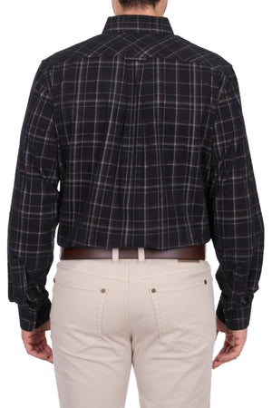 A person is shown from the back, wearing a black plaid Thomas Cook Ben Thermal Shirt and light beige pants with a brown belt against a plain white background.