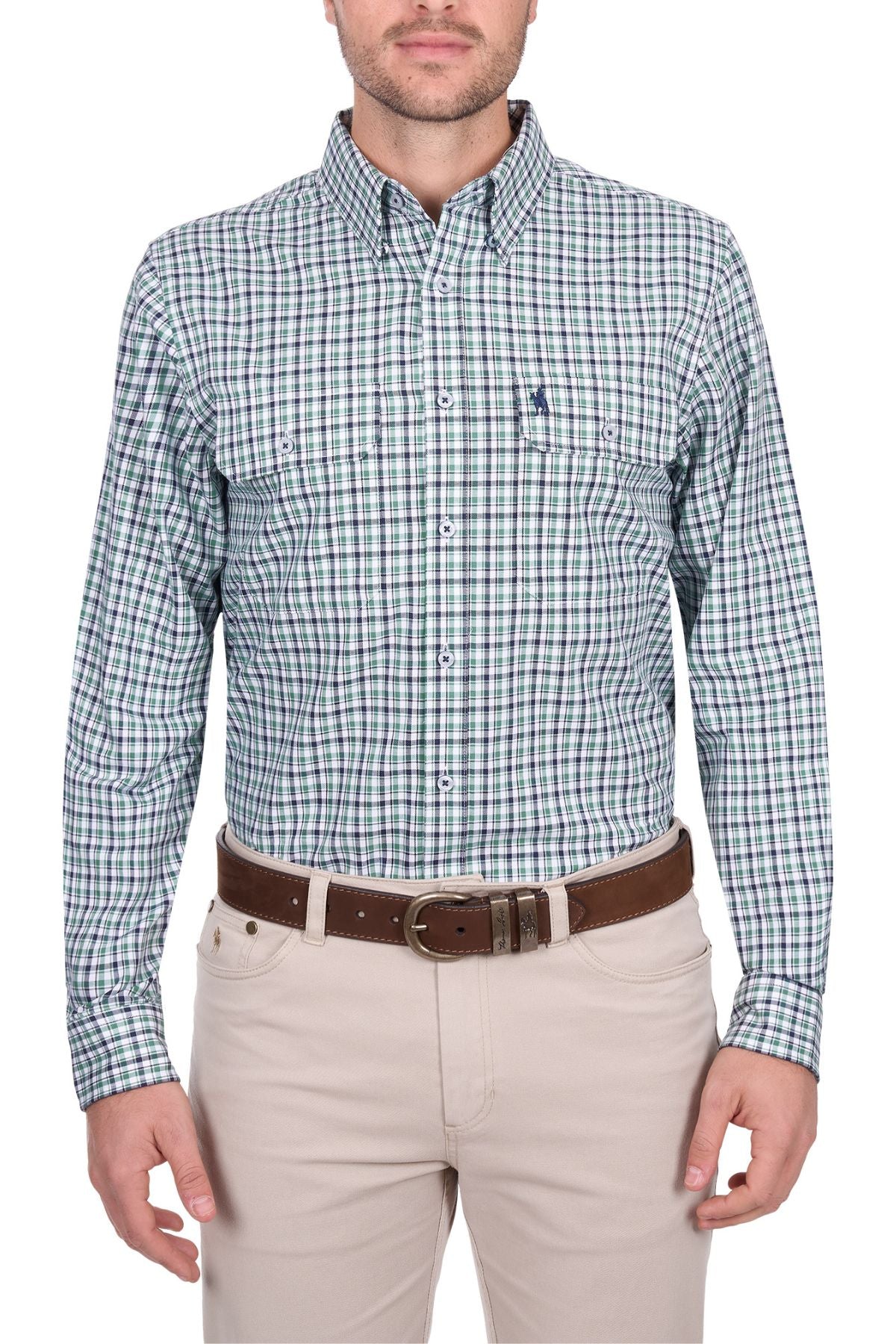 A man stands facing forward against a white background, wearing a green and blue Thomas Cook Edward Shirt paired with beige pants and a brown belt.