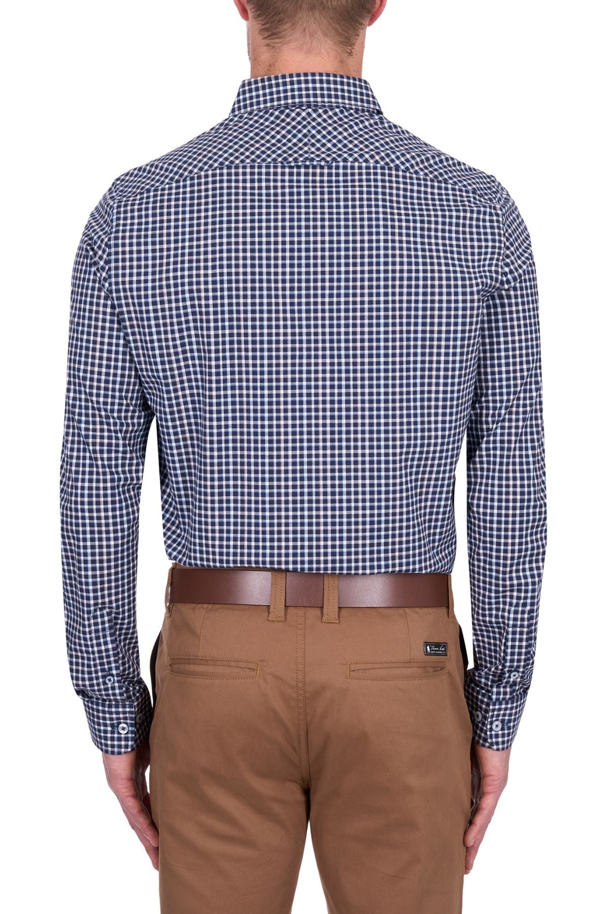 A man stands with his back to the camera, wearing the Thomas Cook Jason Tailored Shirt in navy and white checks, tucked into tan pants with a brown belt, set against a white background.