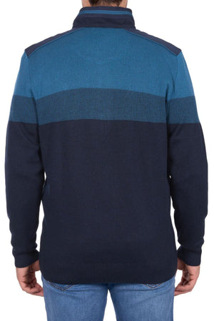 A person is seen from the back, wearing a blue and navy Thomas Cook Jerry 1/4 Zip Jumper with blue jeans against a white background.