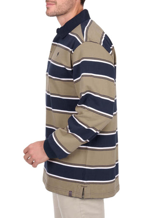 A man shown from the side wears the Thomas Cook Jose Rugby, a long-sleeved collared shirt with olive green, navy blue, and white stripes, paired with light-colored pants.