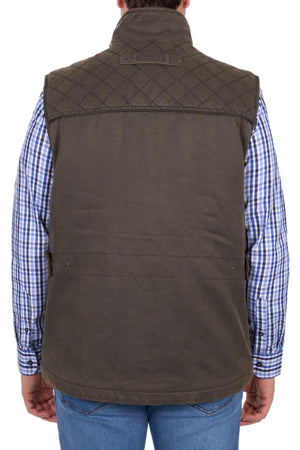A person shown from the back wears the Thomas Cook Marcus Vest in brown over a blue and white plaid shirt and blue jeans, with a plain white background.