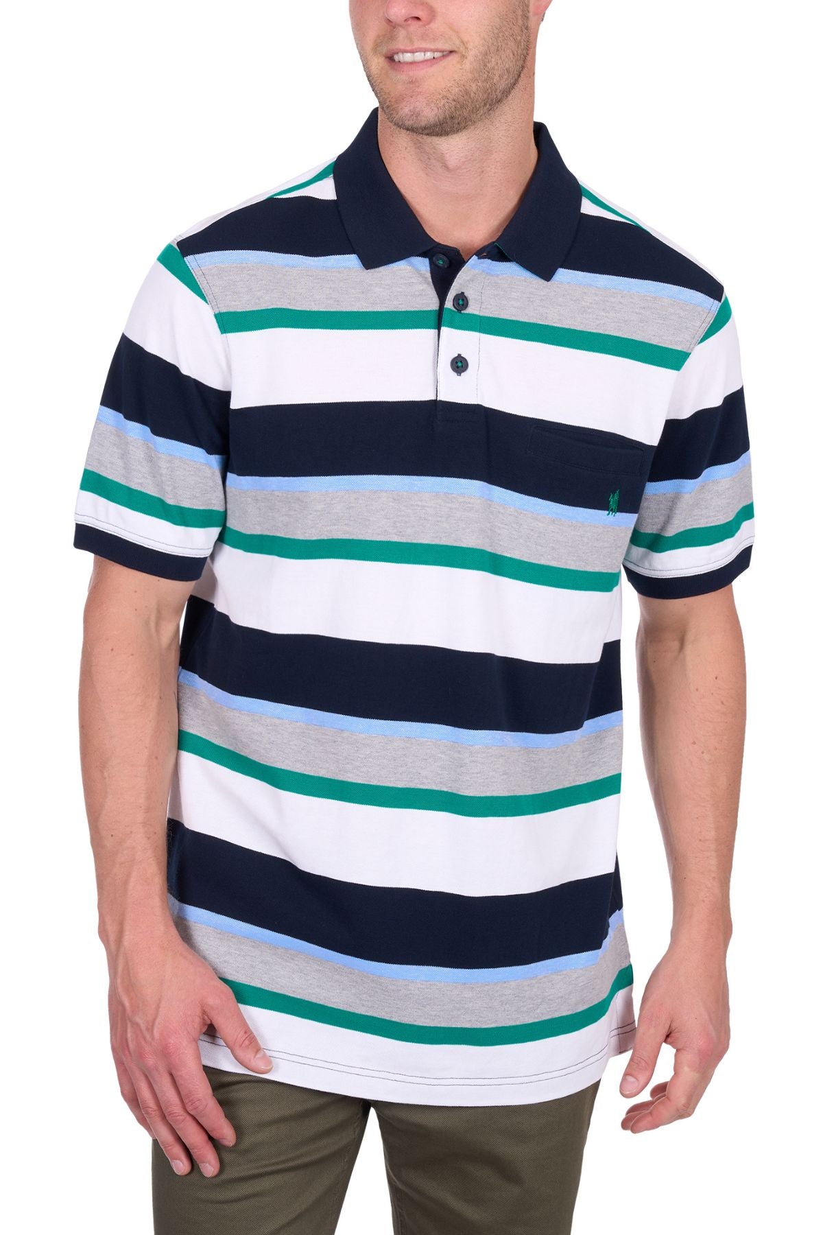 A man wears the Thomas Cook Paul Polo, a cotton pique shirt with multi-colour stripes in navy, white, grey, green, and light blue. He smiles with his right hand by his side and his left hand touching his thigh.