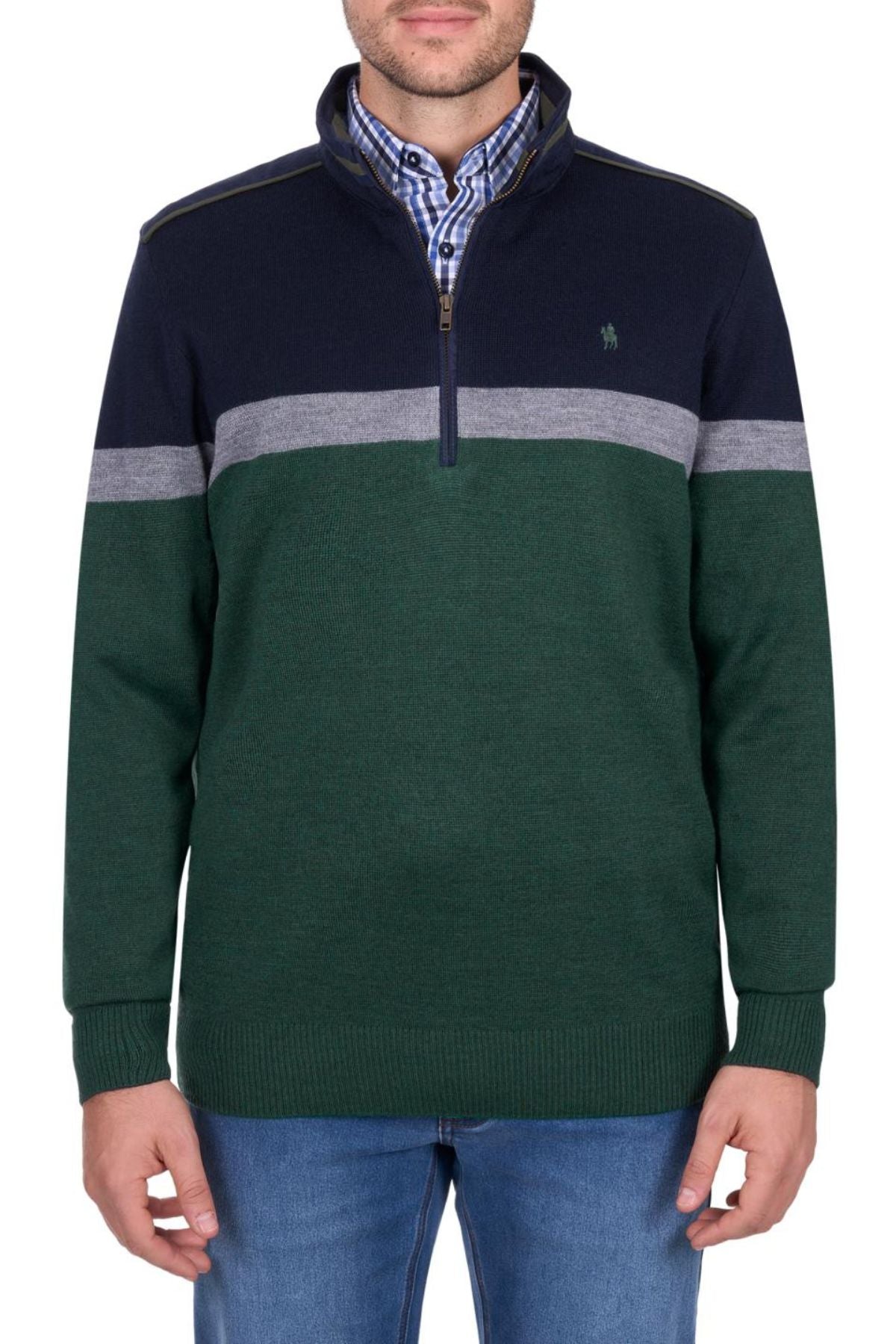 A man wears a Thomas Cook Troy 1/4 Zip Jumper featuring a navy top, gray stripe, and green lower section, styled over a blue checked shirt and blue jeans.