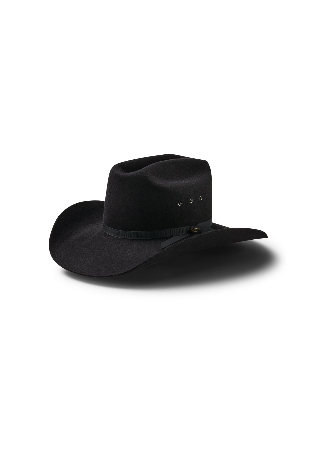 The Akubra Outback Club is a black hat with a wide brim, slightly creased crown, black hatband, and small metal eyelets, shown on a white background with shadow—a style popular in Australian country music.