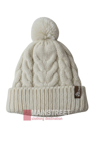 The Anticorp Ladies Cable Lined Beanie features a cream cable knit with folded brim, playful pom-pom, and brown logo tag. Set against a white backdrop with "Mainstreet clothing destination" text at the bottom—perfect beanie style for women.