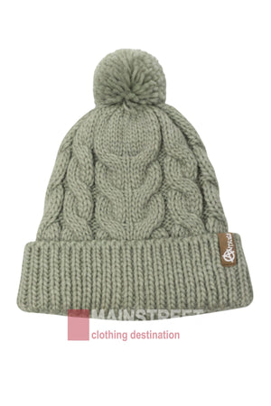 The Anticorp Ladies Cable Lined Beanie is a light gray, chunky cable knit beanie featuring a folded brim, cozy lining, and finished with a small brown Mainstreet label.