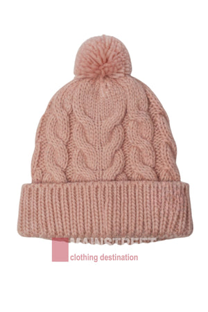 The Anticorp Ladies Cable Lined Beanie is a pink cable knit hat with a folded brim and fluffy pom-pom, featuring "MAINSTREET clothing destination" text partially visible at the bottom.
