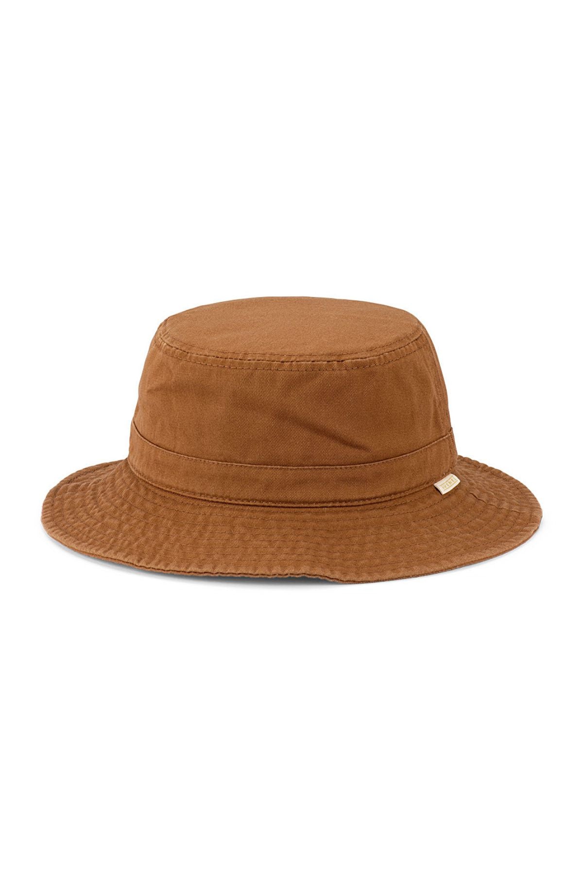 The Avenel Merrick Washed Cotton Small Brim Bucket Hat is a brown, packable style featuring a flat crown, downward-sloping brim, washed cotton fabric, and a small side tag.