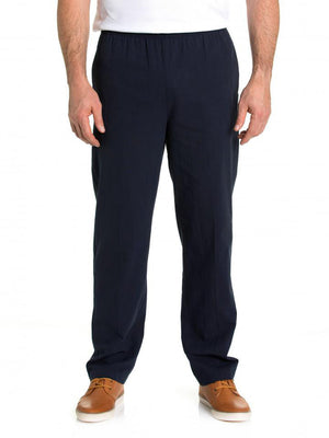 A man wearing Breakaway Crinkle Pants with an elastic waist and comfortable shoes.