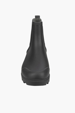 Front view of a single BOGS Holly Chelsea Waterproof Boot in black with a rounded toe, BLOOM Algae Footbed, textured sole, and pull tab at the top, shown on a white background.