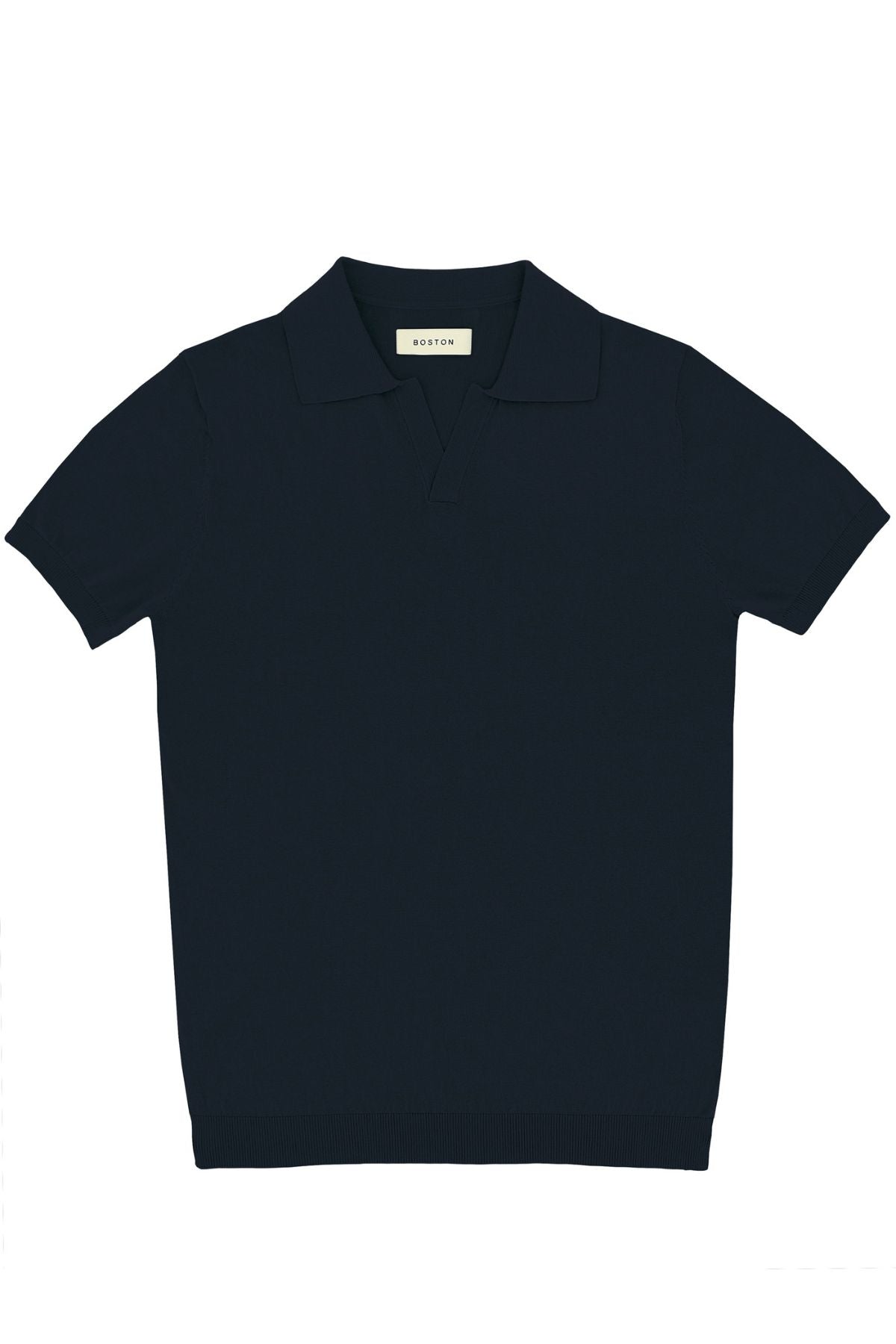 The Boston Knit Polo Shirt is a plain, short-sleeve, dark navy blue collared shirt with no visible buttons, shown flat on a white background.