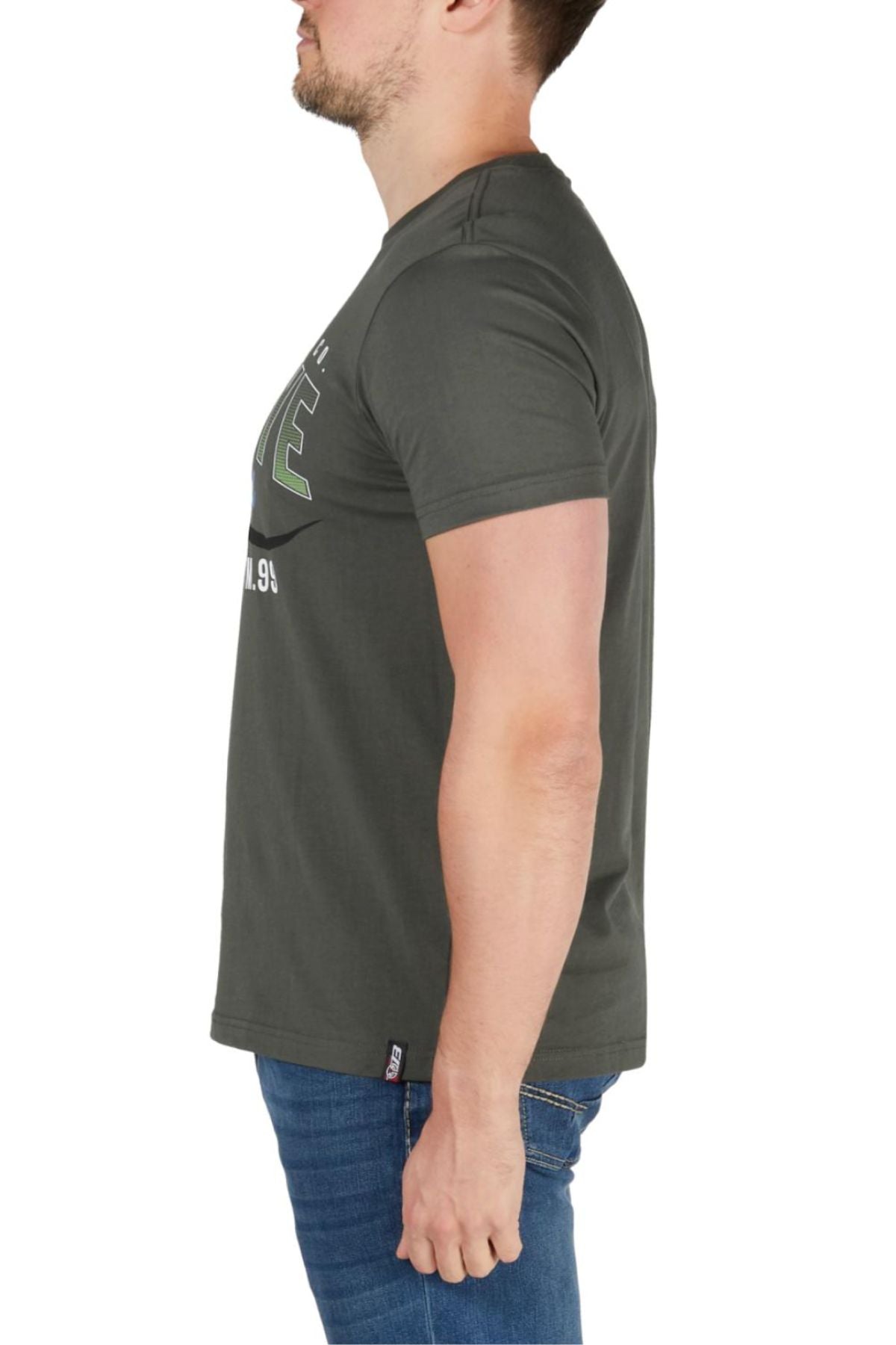 A man in profile against a white background wears a dark gray Bullzye Original Tee in classic fit paired with blue jeans.