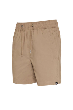 The CAT Hydraulic Short in beige features stretch fabric, an elastic waistband, side pockets, and a small black logo tag near the hem, shown against a white background.