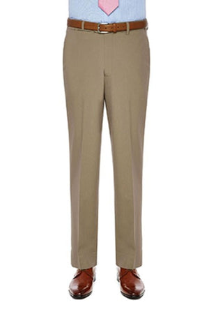 A person wearing City Club Carter 183 tan trousers made from a blend of polyester and wool, a light blue dress shirt with a pink tie, and brown leather dress shoes. They are posed against a white background, and only the lower half of their body is visible.