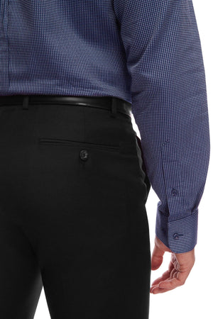 A close-up of a person wearing a blue, long-sleeved, checkered shirt and black City Club SHIMA 1007 pants with a comfortable fit. The image shows the back and side view, focusing on the details of the fabric and the button closure of the flexi-waist pants' back pocket. The person's hand is visible at their side.