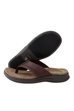 A pair of Colorado Incara Leather Thongs in brown with dark brown straps, tan memory foam footbeds, and black textured slip-resistant soles—displayed with one thong upright and the other showing the sole.