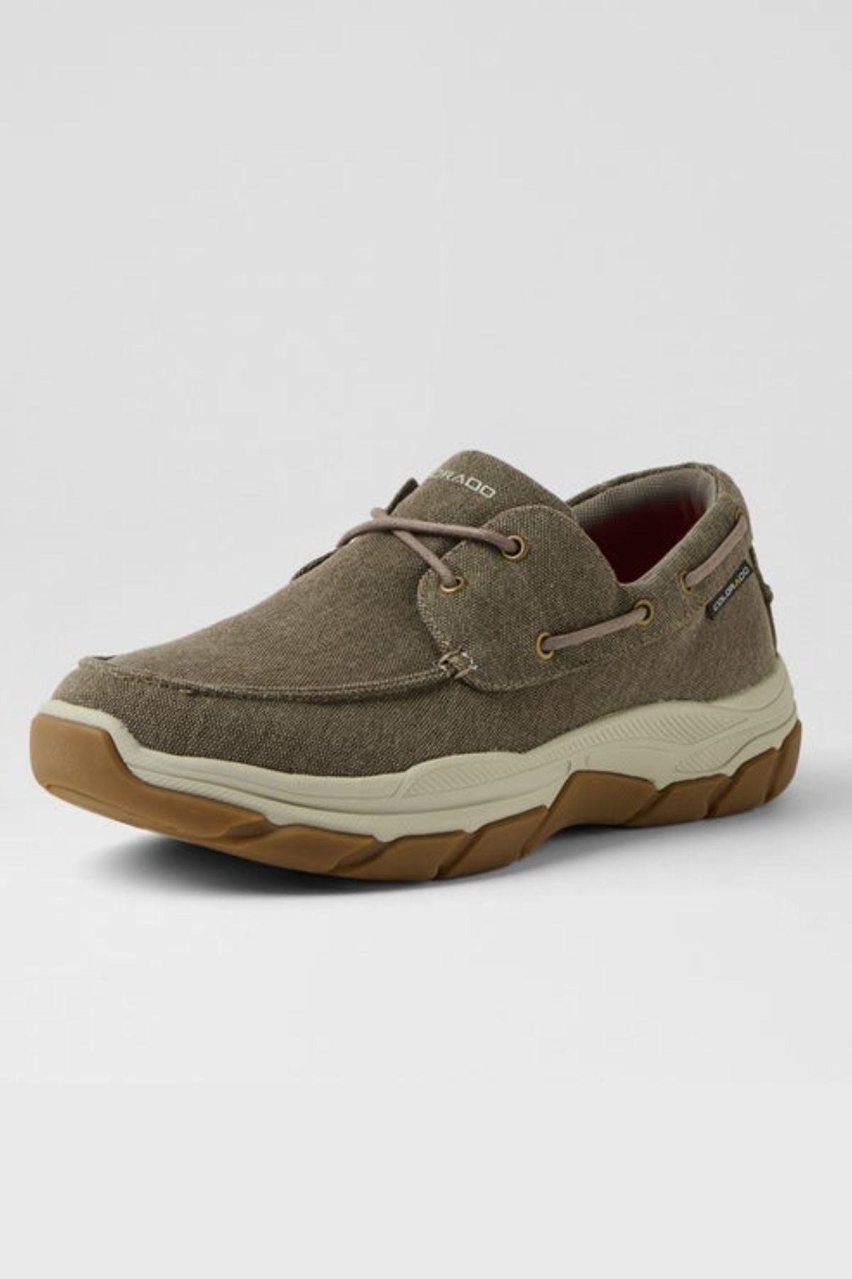 The Colorado Kanebo Canvas Shoe is a single brown casual shoe with tan laces and a white textured sole, angled left on a light gray background, designed for all-day comfort with supportive arches.