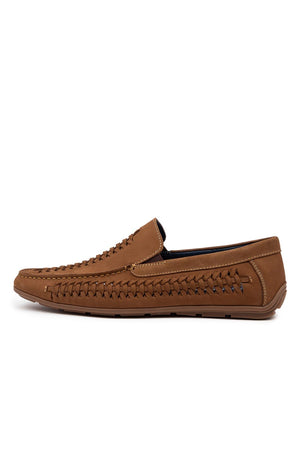 The Colorado Massar Casual Shoe is a brown woven leather loafer with visible stitching, a flat high-traction rubber sole, and is displayed in side profile against a white background.