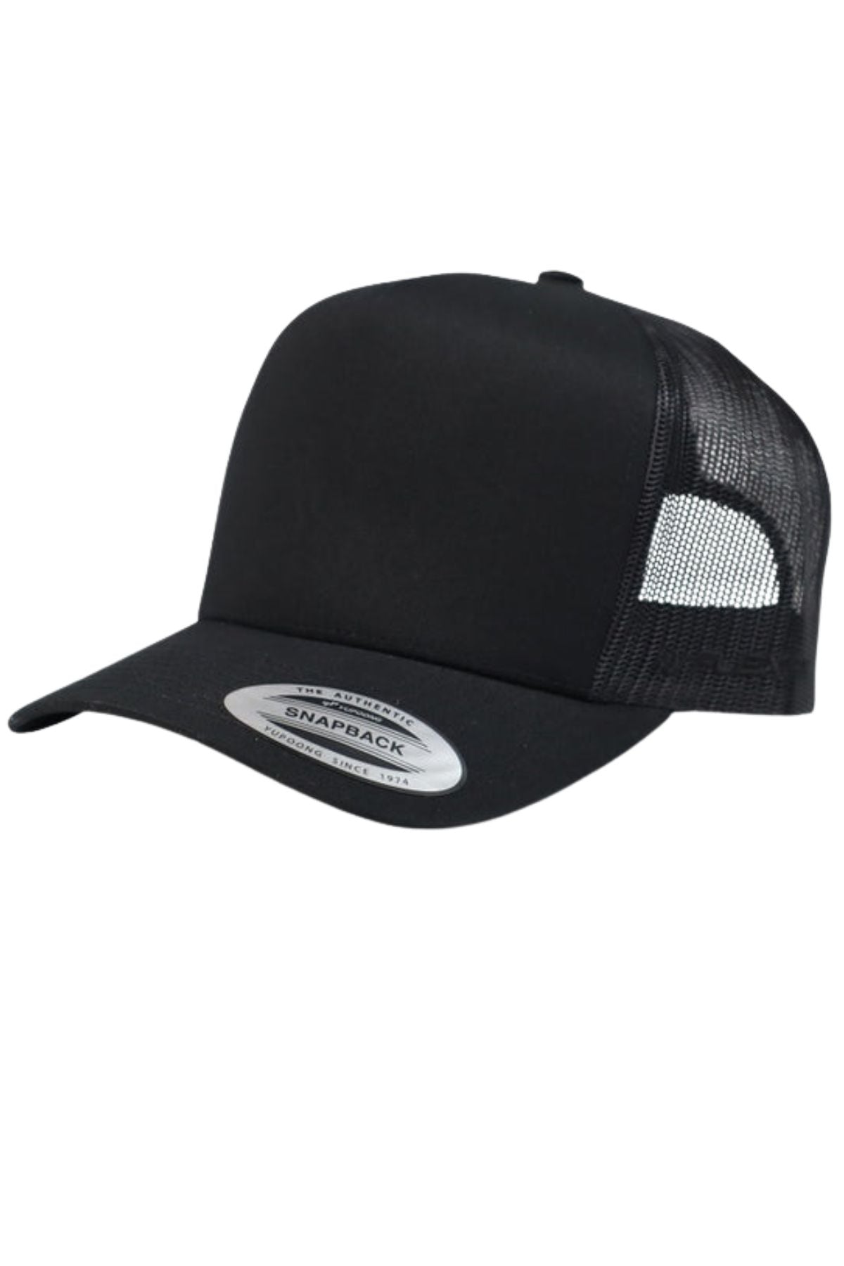 The FlexFit Trucker Cap is black with mesh back panels, a curved brim, and an adjustable snapback closure, shown on a white background.
