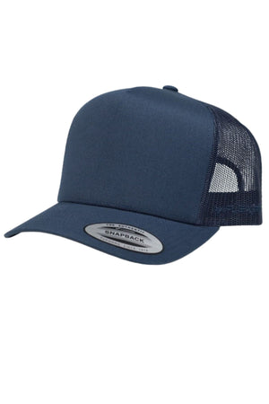 The FlexFit Trucker Cap in navy blue features a mesh back and adjustable snapback closure, shown on a white background.