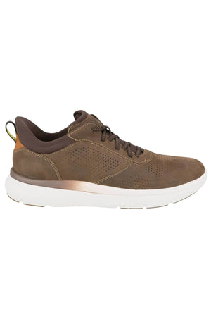 The Florsheim Fleet Perf Sneaker is a brown athletic shoe with a perforated leather upper, SupaStep design, white rubber sole, dark brown laces, and a tan accent on the heel.