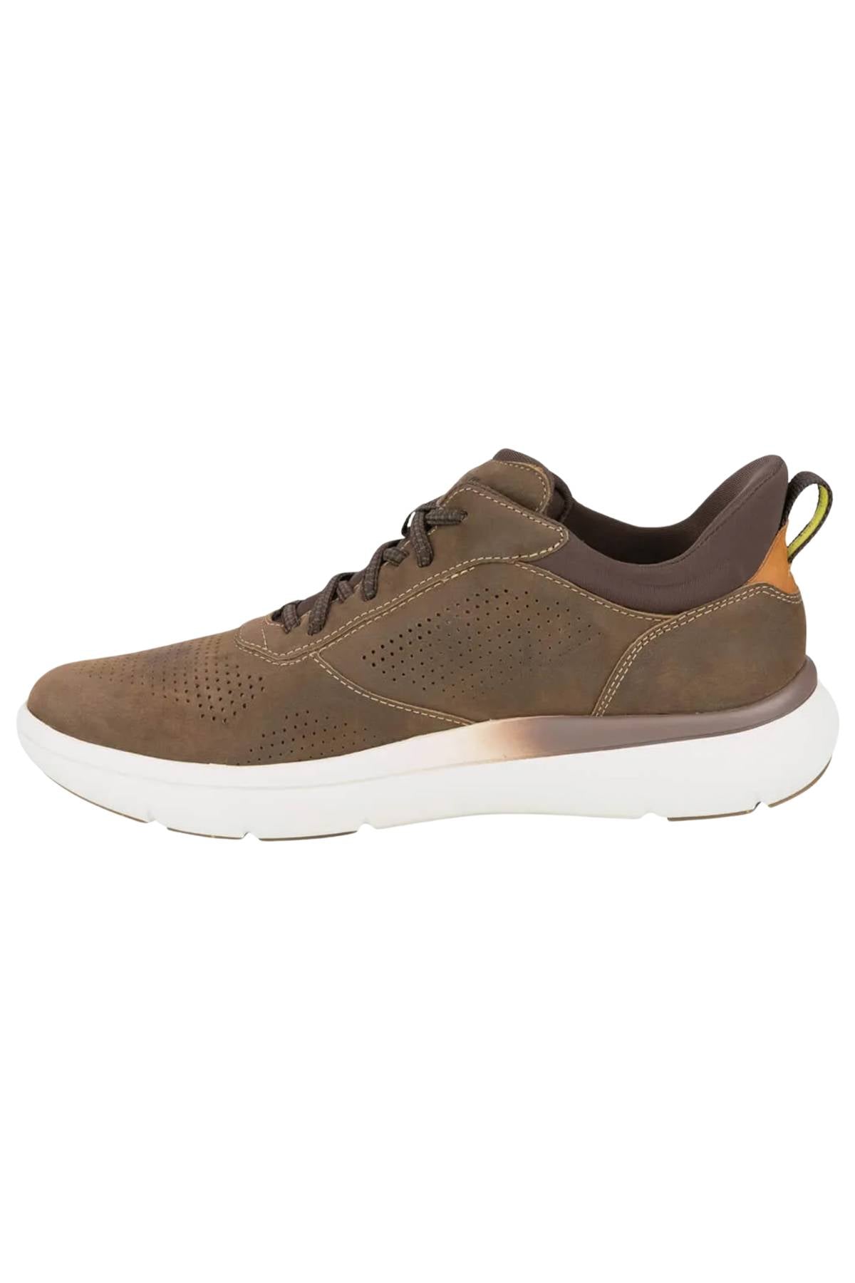 The Florsheim Fleet Perf Sneaker is a brown athletic shoe with a white sole, SupaStep design, side perforations, dark brown laces, and a yellow heel pull tab, shown in side profile.