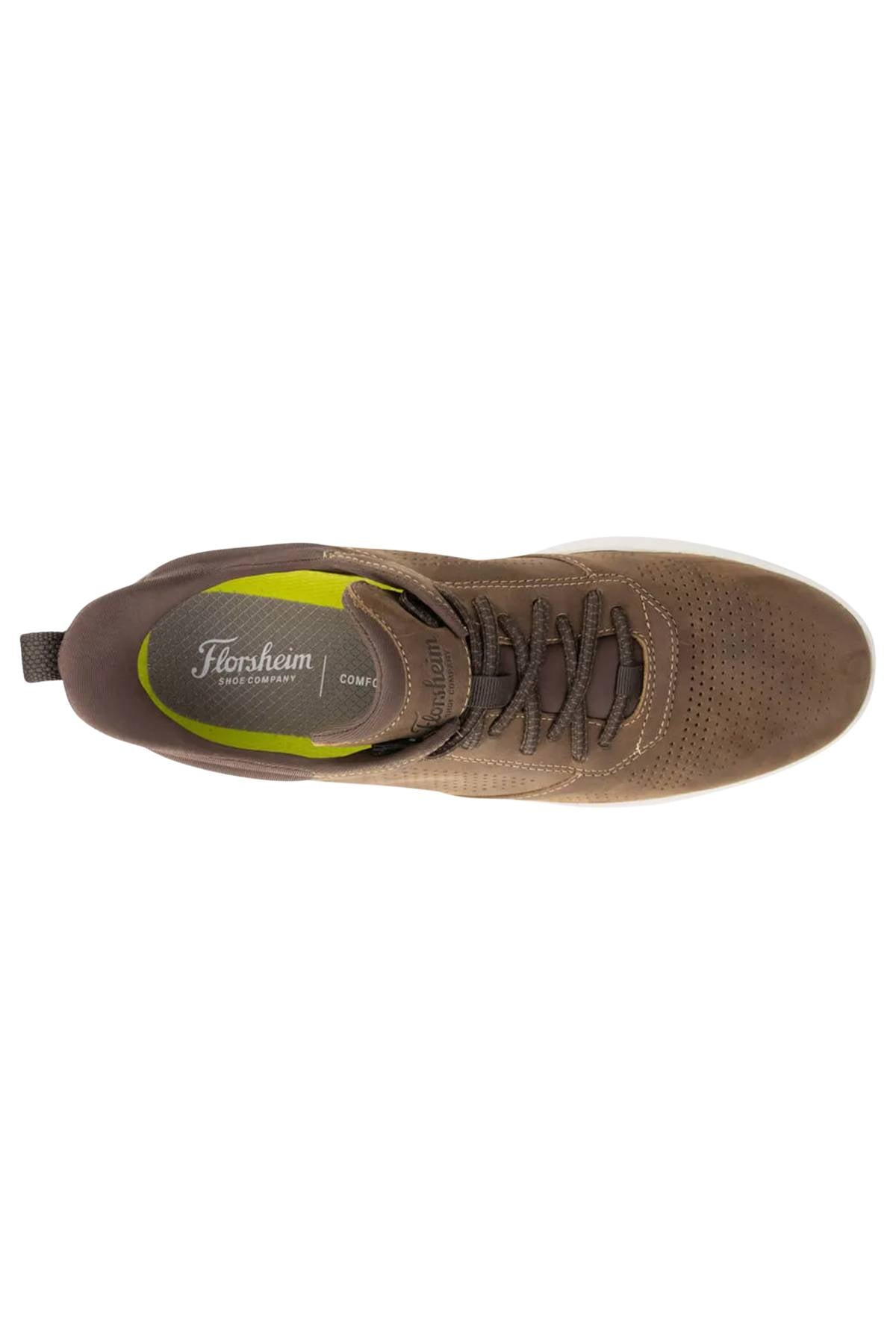Top view of a brown Florsheim Fleet Perf Sneaker with perforated toe, brown laces, and a cushioned Comfortech footbed labeled "Florsheim COMET" with green accents for all-day comfort.