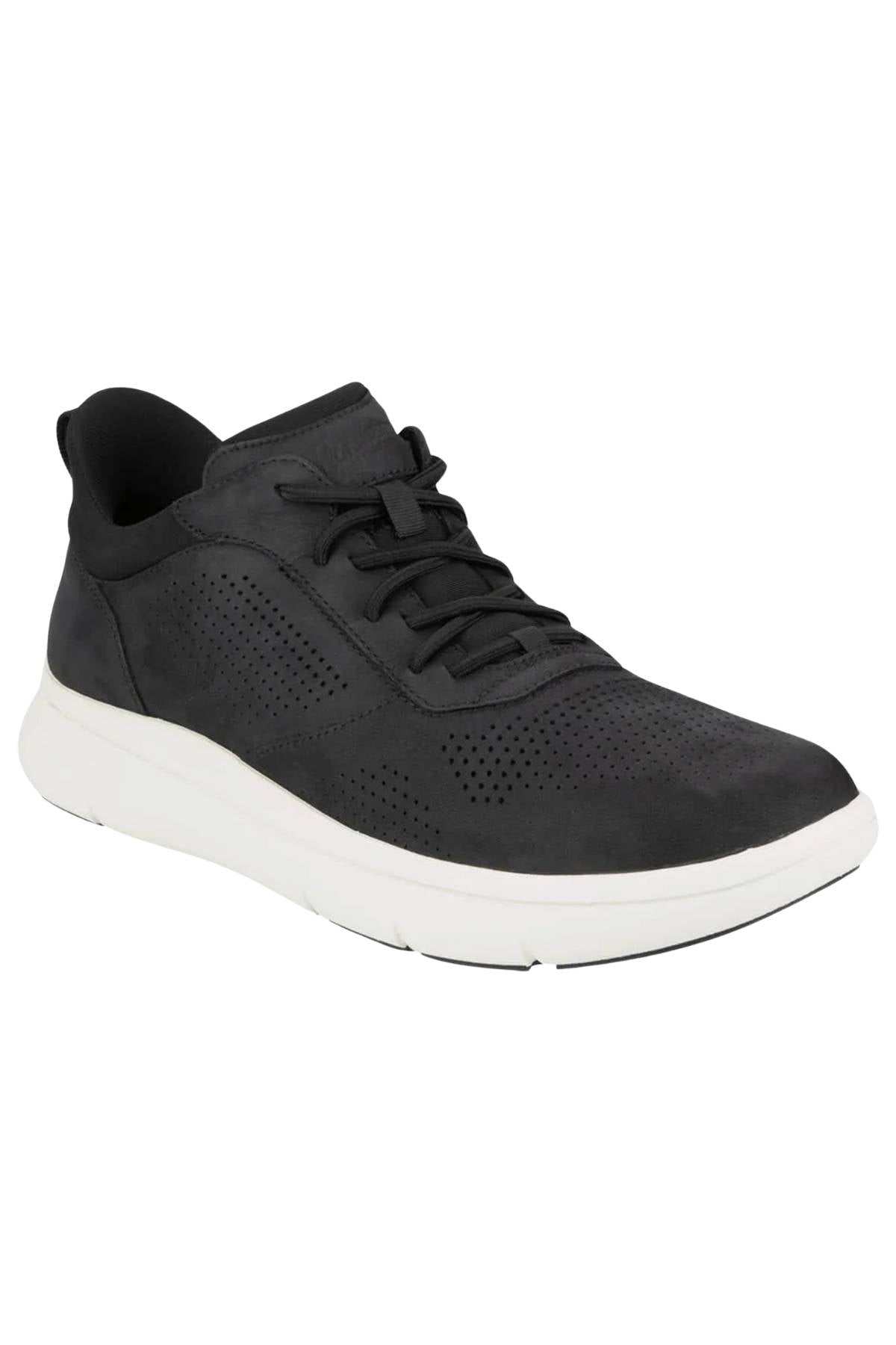 The Florsheim Fleet Perf Sneaker has a Comfortech footbed, black perforated upper, black laces, white sole, and low-top design, displayed at a three-quarter angle on a plain white background.