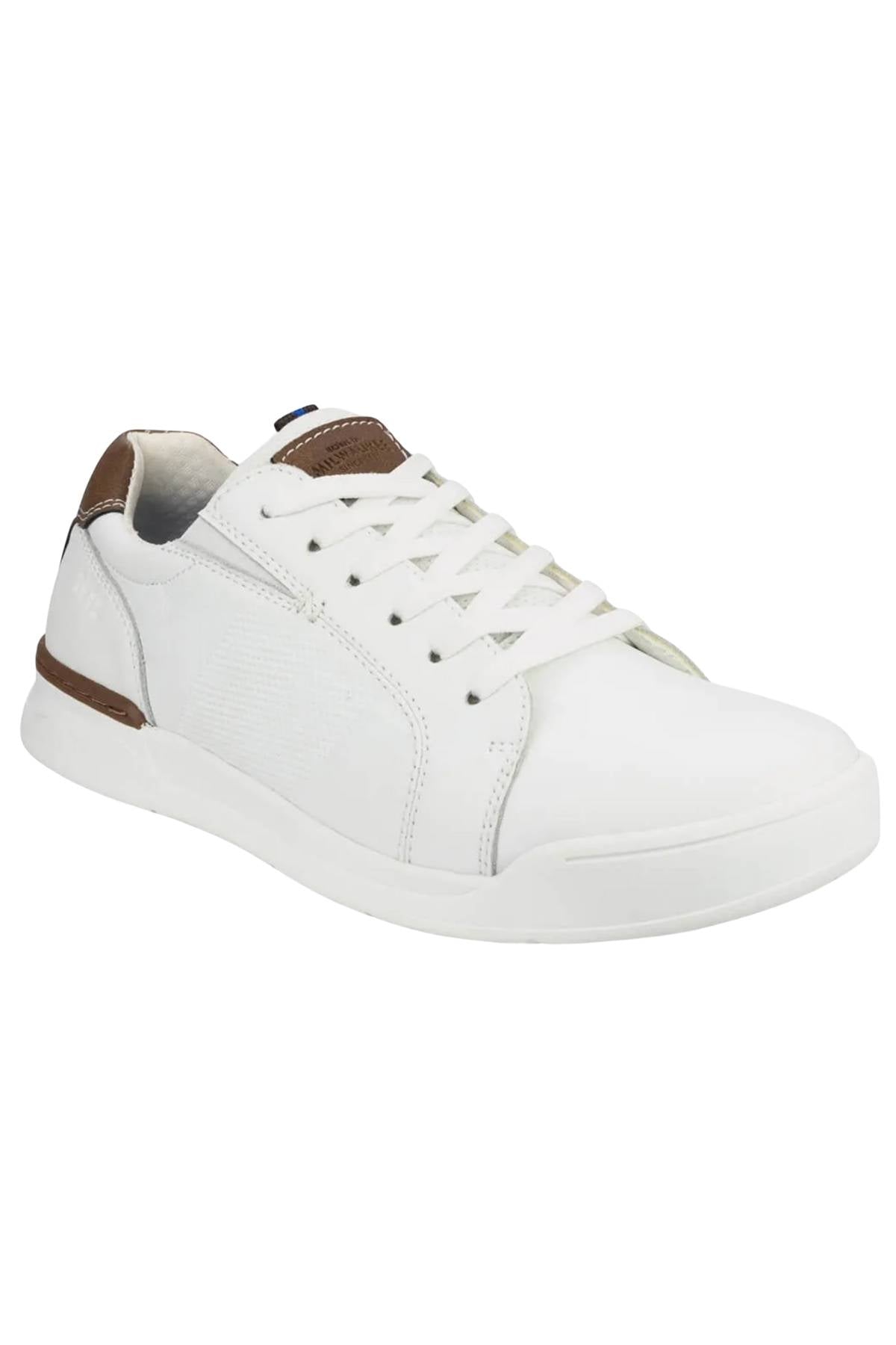 The Florsheim Kore Tour Lace Sneaker is a white low-top shoe with white laces, a lightweight EVA sole, and brown accents on the heel and tongue, shown against a plain white background.