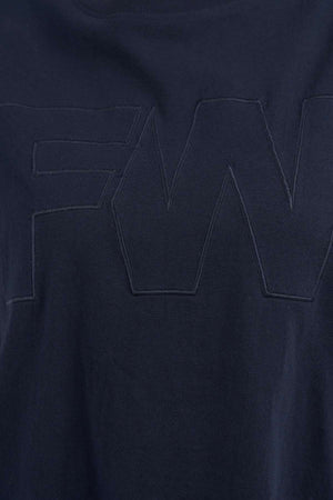 Close-up of a navy blue Foxwood FW Embroidery Tee, featuring large "FW" letters in satin embroidery. Made from 100% cotton.
