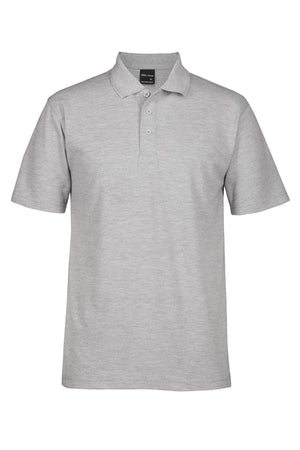 The JBs Short Sleeve Polo is a durable light grey shirt featuring short sleeves, a collar, and three buttons, shown on a white background.