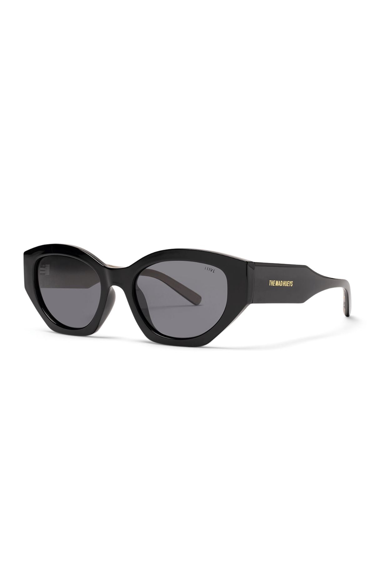 A pair of Liive Cabron Polarised Sunglasses featuring a black cat-eye frame, dark smoke lenses, and "THE MAD HUEYS" in gold lettering on the left arm.