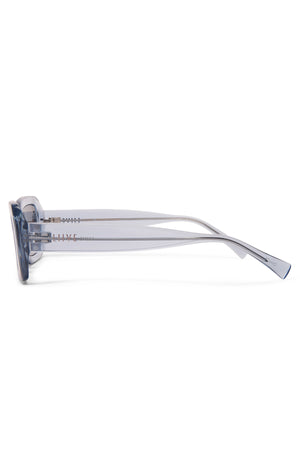 Side view of translucent light blue Liive Crush Sunglasses with square frames and slim arms on a white background—a vintage 90s-inspired look combined with modern UV protection.