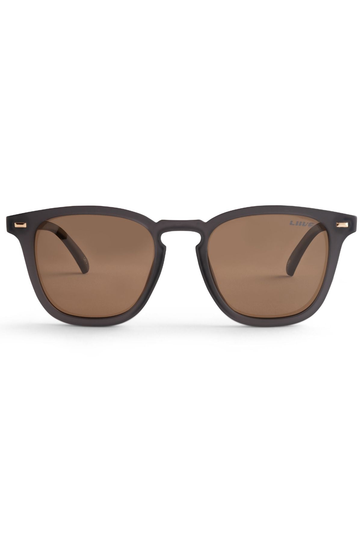 The Liive Manhattan Polar Sunglasses feature black frames with brown tinted, polarized lenses that provide UV protection. With a classic rectangular design, these sunglasses are perfect for both casual and formal occasions. The durable polycarbonate frame withstands everyday use, and the plain white backdrop accentuates the sunglasses' style.