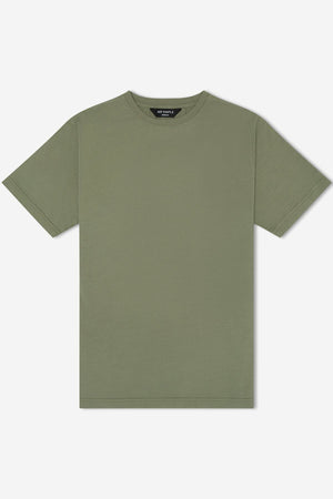 The Mr Simple Reginald Organic Tee is a plain olive-green short-sleeve T-shirt with a crew neck, crafted from organic cotton. It boasts a minimalist design and smooth fabric, offering a sustainable fit. Displayed against a white background, it includes a small black label at the inside back of the neckline.