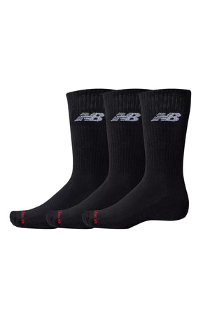 Three pairs of New Balance Everday Crew Socks 3pk with cushioned footbeds and NB DRY fast-drying technology, featuring a white logo near the top and red toe accents, are displayed side by side on a white background.