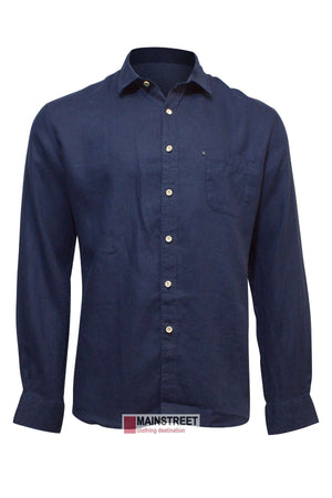 A long-sleeved, dark blue Pilbara Linen Shirt featuring a single chest pocket and white buttons. The shirt is displayed on a white background, placed in front of a label that reads "MAINSTREET clothing destination.