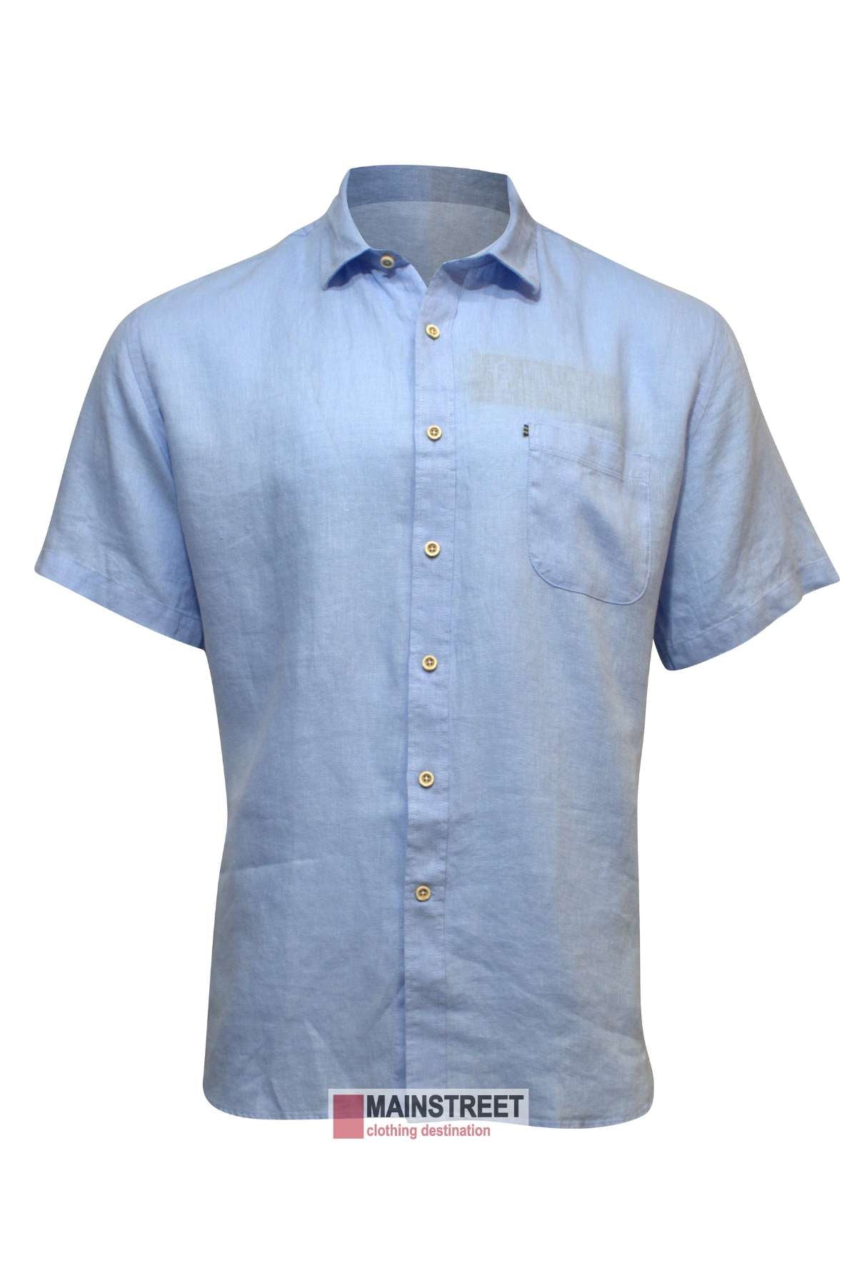 A Pilbara Linen Short light blue short-sleeve button-up shirt with a collar and a single chest pocket is displayed against a white background. The "MAINSTREET clothing destination" logo is at the bottom center of the image.
