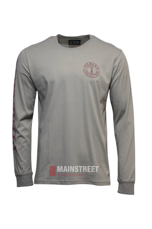The Pilbara Long Sleeve T-Shirt is a light gray, 100% cotton tee with a round neck, elastic cuffs, small chest logo, and bold red text down the right sleeve. Displayed against a white background.