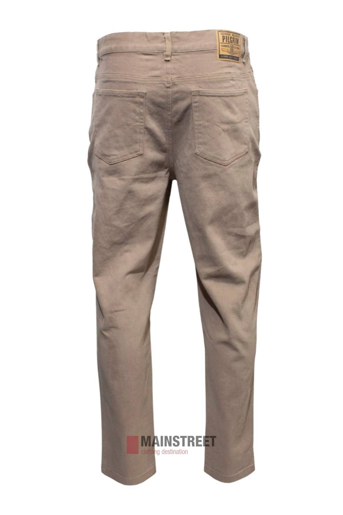 The Pilgrim Moleskin Jean is shown from the back in beige, featuring two rear pockets, belt loops, and a tan label on the waistband. Made from Cotton/Elastane blend, these regular fit pants are displayed against a white background.