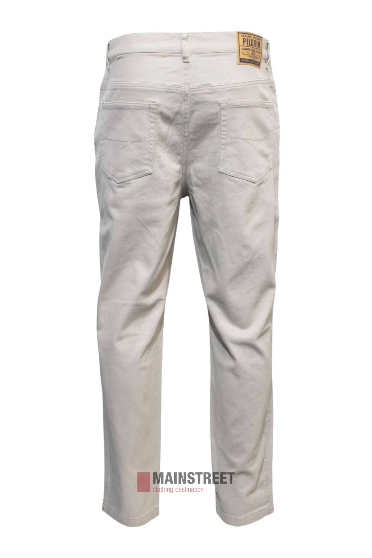 Back view of the Pilgrim Moleskin Jean in light beige, featuring patch pockets and a leather brand label on the waistband, shown against a plain white background.