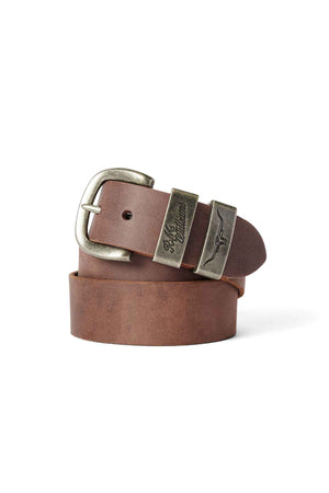 The RM Williams Drover Belt features a vegetable-tanned leather strap and an antique brass buckle with engraved designs and text. Coiled in a flat spiral, its buckle offers a vintage, worn look that adds timeless charm.