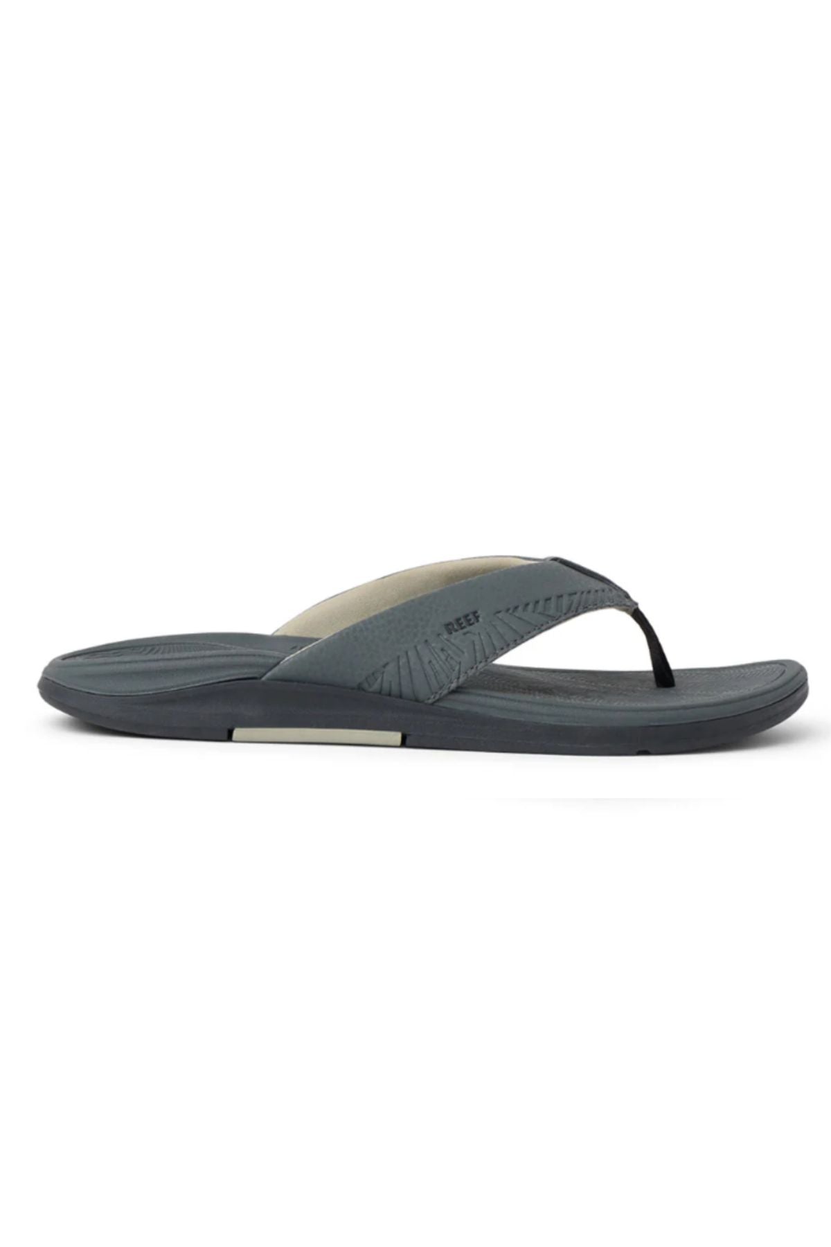 The REEF Offshore flip-flop is shown in a side profile view against a white background, featuring a dark gray color, textured sole, thin black straps, and built-in arch support.