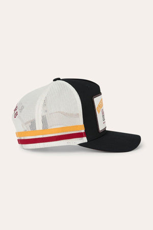 The Ringers Western Live Rodeo Deep Fit Trucker Cap features a black front panel with a rectangular patch, bold red and yellow stripes on the side, and a solid black brim. Its back half is crafted from white mesh for breathability.