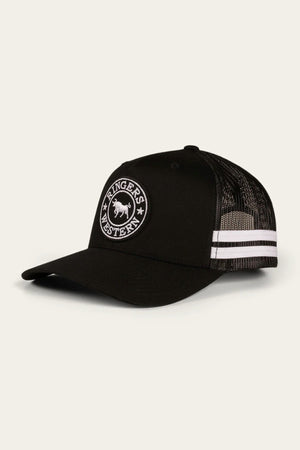 The Ringers Western McCoy Trucker Cap is a stylish black baseball cap characterized by its curved brim and breathable mesh back. It features two white stripes and sports a circular embroidered patch on the front, showcasing a bull design encircled by the words "RINGERS WESTERN.